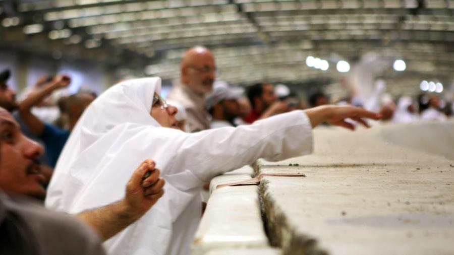 At the Hajj, A pilgrim participates in a ritualistic throwing of rocks symbolizing the prophet Abraham’s defiance of the devil.Photo credit: Shakeb Ahmed