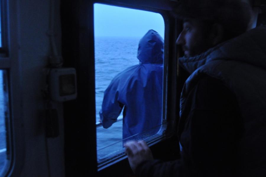 captain luis santana stares out over the atlantic ocean, hopeing for sardines