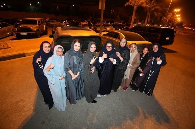 Saudi women celebrate after they drove their cars in Al Khobar, Saudi Arabia, June 24, 2018.