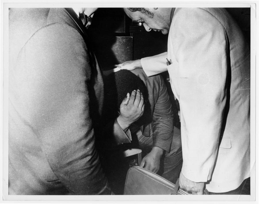 Roosevelt Grier, one of Robert Kennedy’s entourage who helped wrestle the gun out of Sirhan’s hands, breaks down after the shooting. 