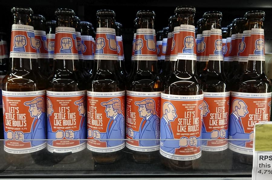 Beer labeled "Let's Settle This Like Adults," produced by Finnish Rock Paper Scissors brewing company, is seen in a grocery store ahead of President Donald Trump and Russian President Vladimir Putin's summit in Helsinki, Finland, July 11, 2018.