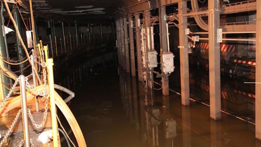 Floodwaters fill an underground subway tunnel