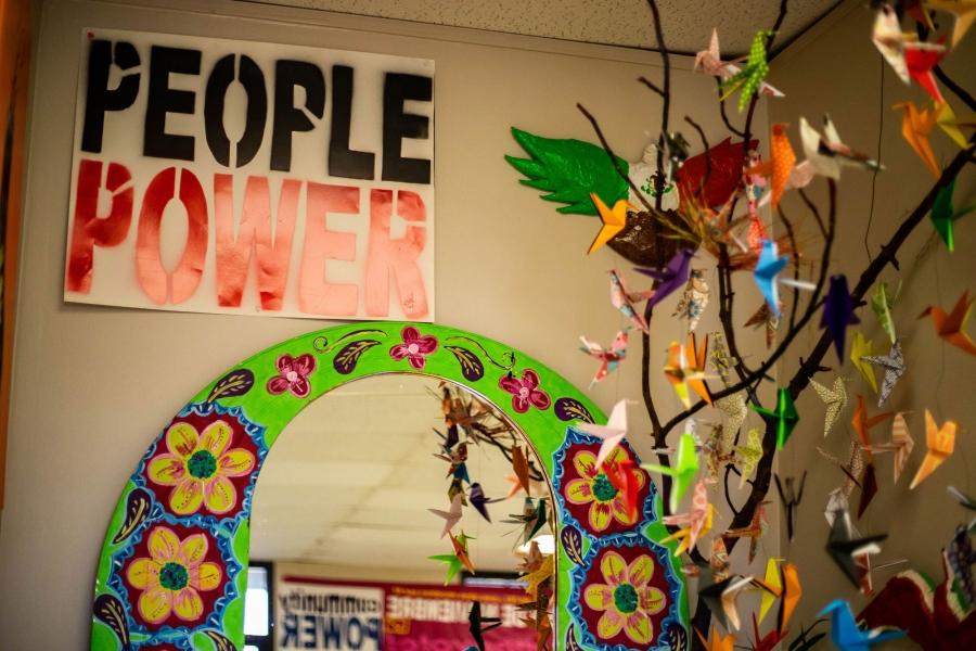 A sign hanging in the office of the Georgia Latino Alliance for Human Rights reads, "People Power."