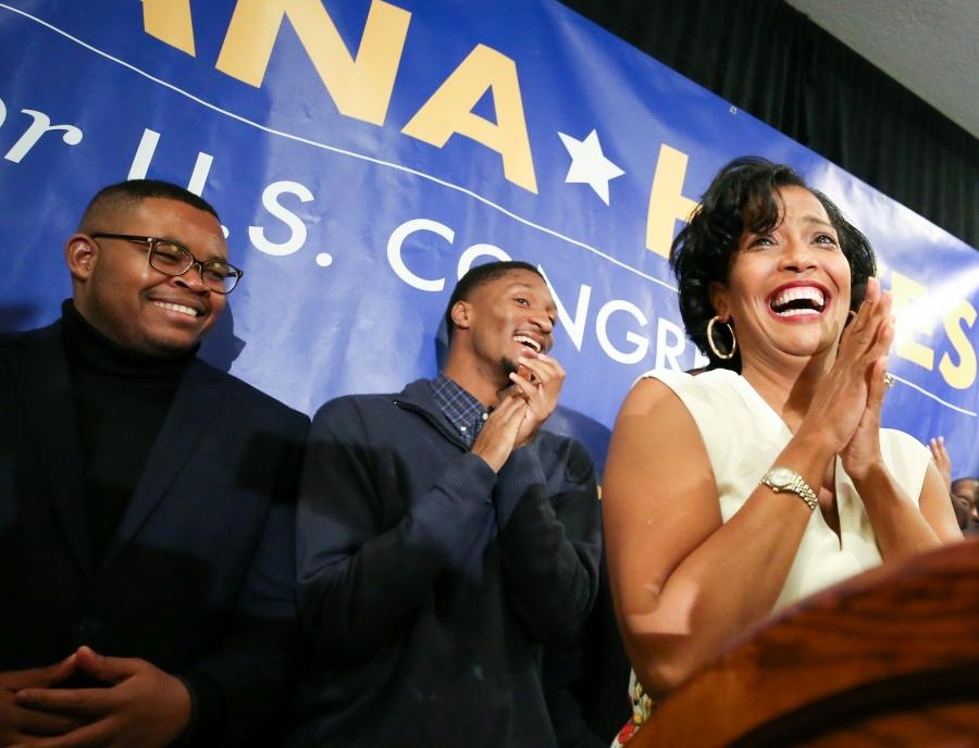 Representative-elect Jahana Hayes clasps her hands with tears in her eyes 