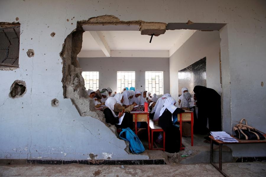 Girls attend a class at their school, damaged by a recent Saudi-led air strike, in the Red Sea port city of Hodeidah, Yemen October 24, 2017