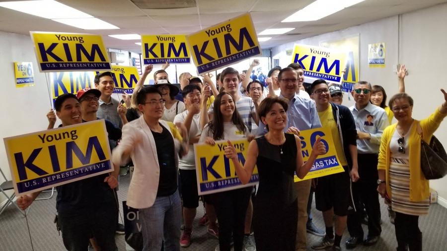 Young Kim, the first Korean American woman elected to US Congress stands with supporters in a Facebook photo on her campaign page. 