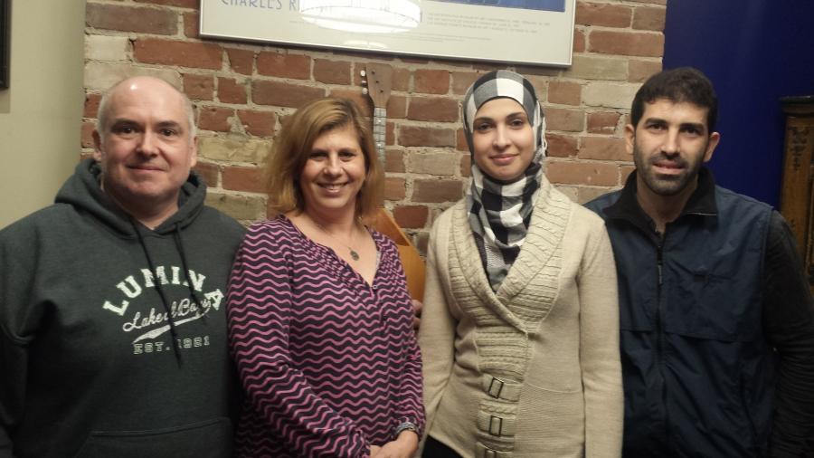 Chris Monahan (far left) and Ashley McCaal (near left) sponsored Ghader Bsmar (near right) and Hamzeh Mourad (far right) after the Syrian family arrived last December. 