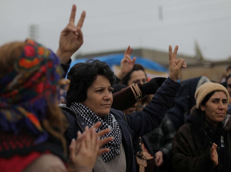 A woman gestures during a protest