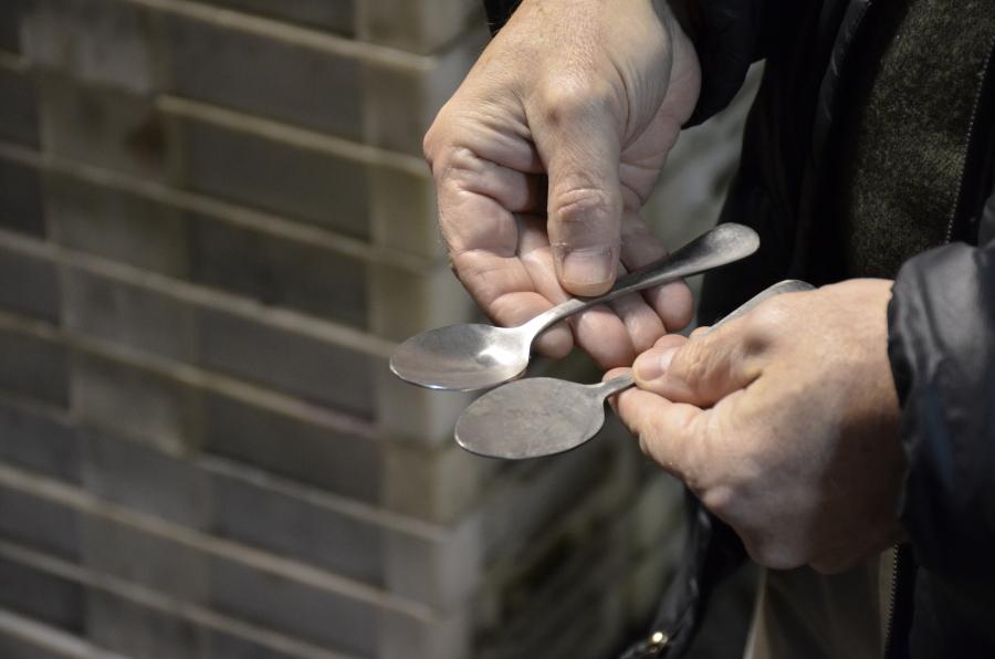 Greg Owens, CEO of Liberty Tabletop, holds two spoons at various stages of the production process in Sherrill, New York. The upstate New York city is nicknamed “The Silver City.” 