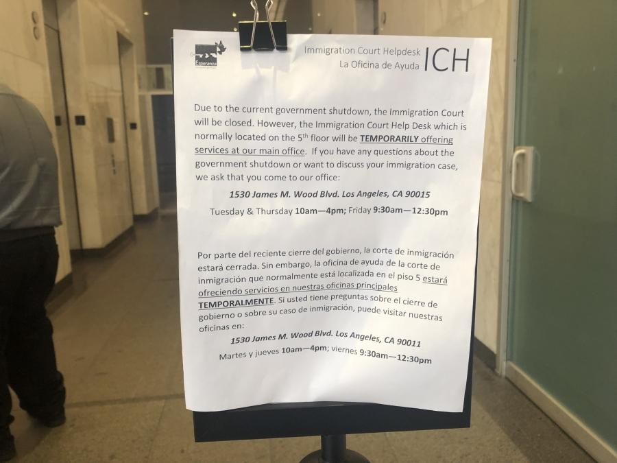 A sign in the lobby of the Los Angeles immigration court explains the court is closed due to a partial government shutdown.