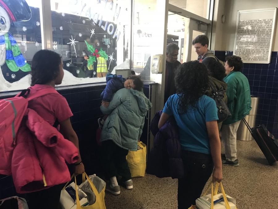 Migrants just released from detention at a Greyhound bus station in San Antonio