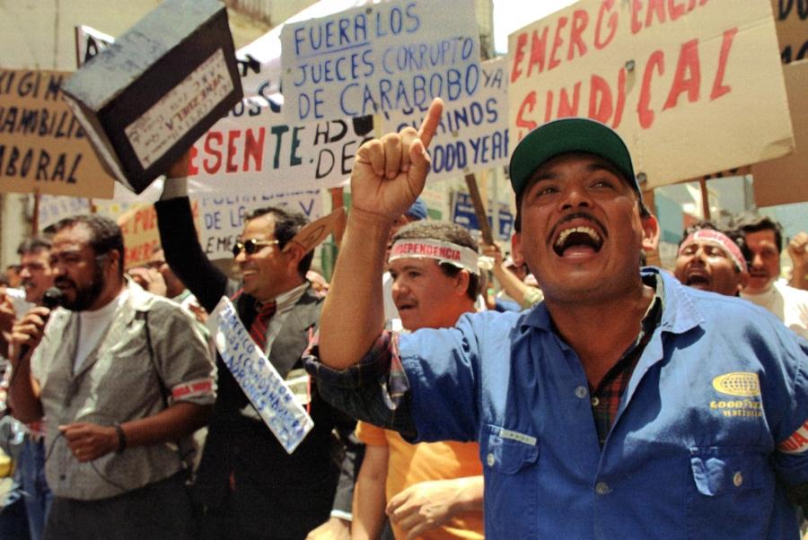 Protesters shout out for the end of political and economic corruption in front of the Venezuelan Congress, September 1999. 