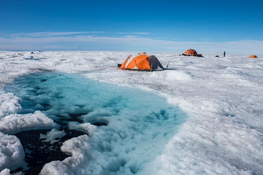 Glaciologist Joel Harper's team stays in tents right on the Greenland ice sheet