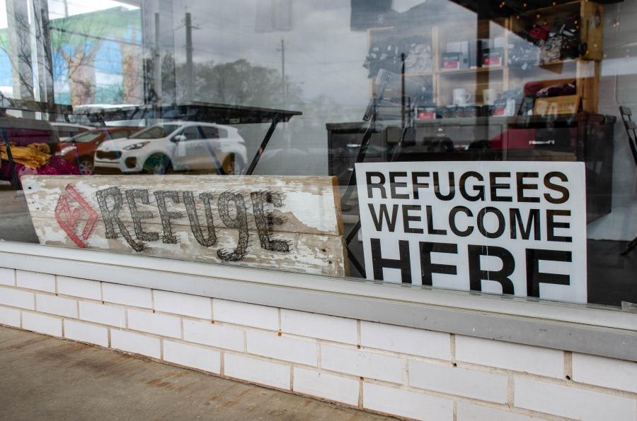 A sign welcomes Georgia’s newest arrivals at the Refuge Coffee Shop in Clarkston. 