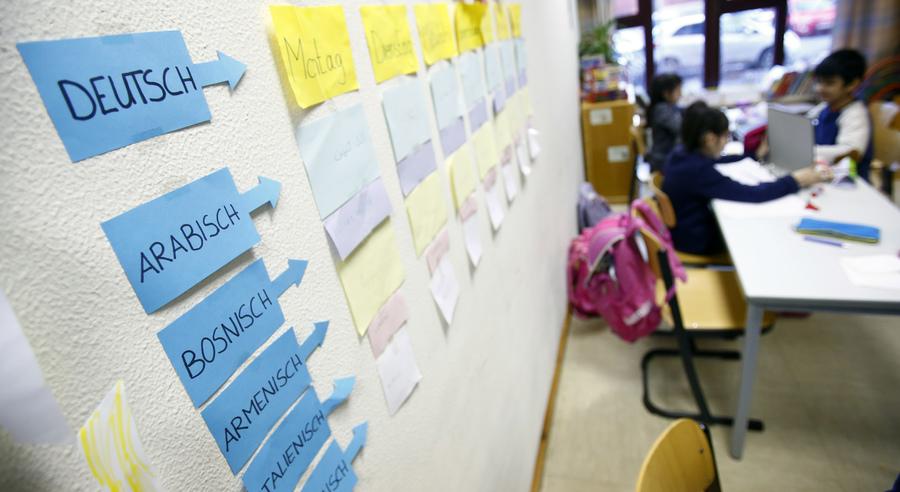 Berlin now has about 1,100 welcome classes in its more than 600 schools. Here, notes on a wall help students from different countries learn German at the Sankt Franziskus school, Jan. 22, 2016.