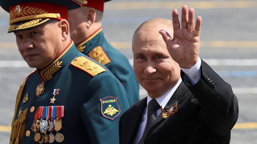 President Vladimir Putin waves
