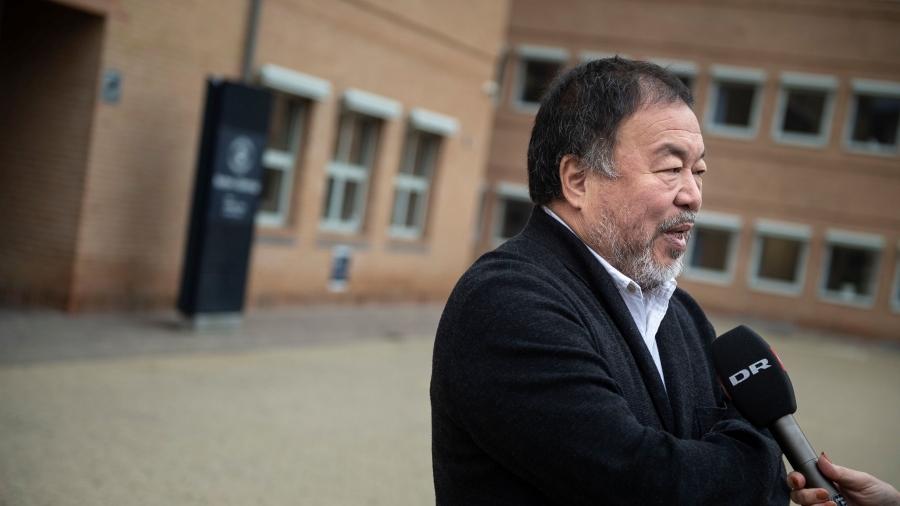 Chinese artist and activist Ai Weiwei speaks with Danish media before entering the court for a case against the Danish importer of Volkswagen in Glostrup, Denmark May 22, 2019. Ai Weiwei claims that Skandinavisk Motor Co. A/S has violated his copyright. I