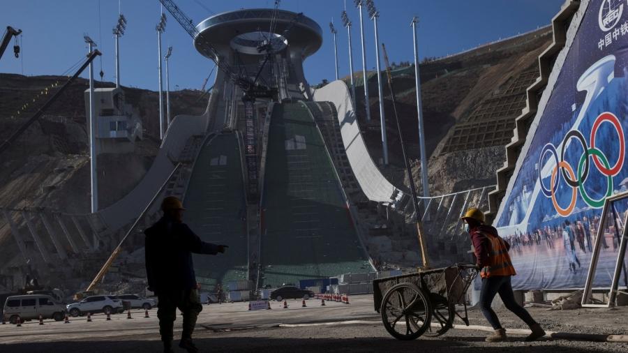 Laborers work at the construction site of the ski jump arena of the 2022 Winter Olympics in the Chongli district of Zhangjiakou, Hebei province, China, Oct. 29, 2020.