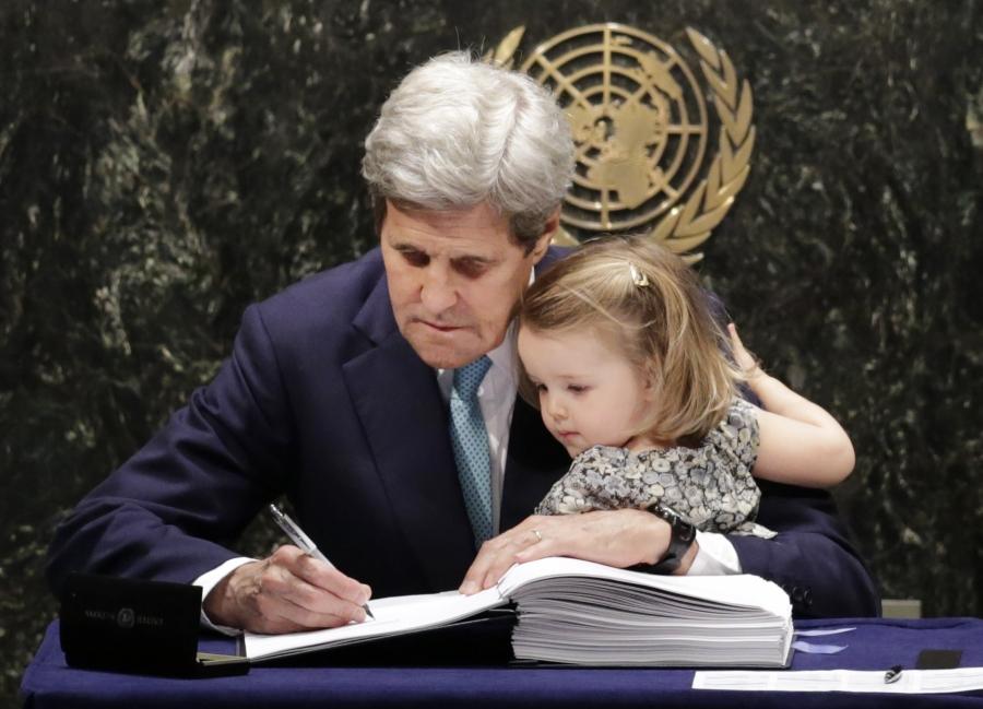 John Kerry and his cute granddaughter at the UN, where he is signing the treaty