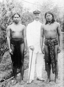 On right, a photo of my great-grandfather, Jan Jongejans, in Indonesia with two local Dayak men.