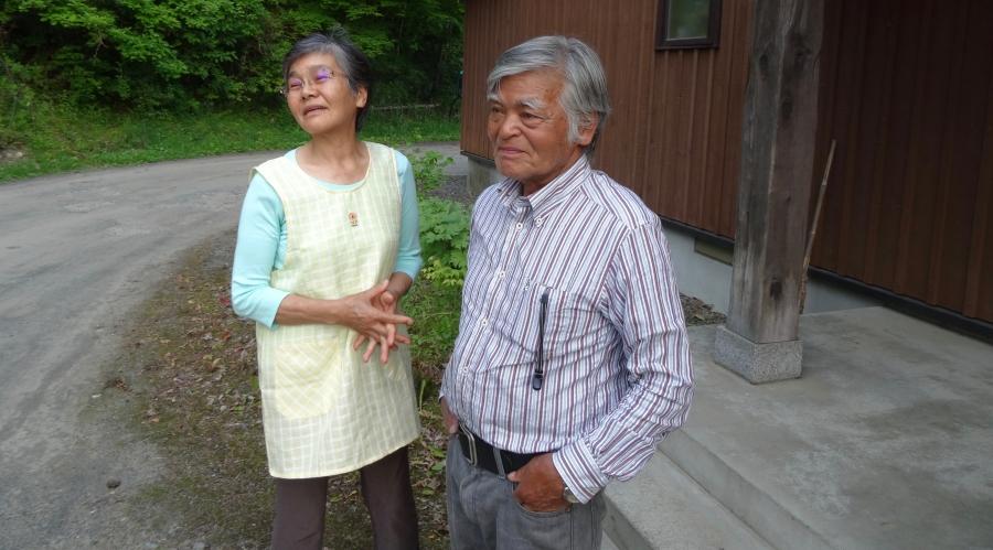 Ainu activist Koichi Kaizawa and his wife Miwako outside their home in Nibutani, Japan. 