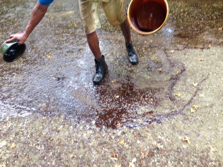 Pouring molasses onto the road