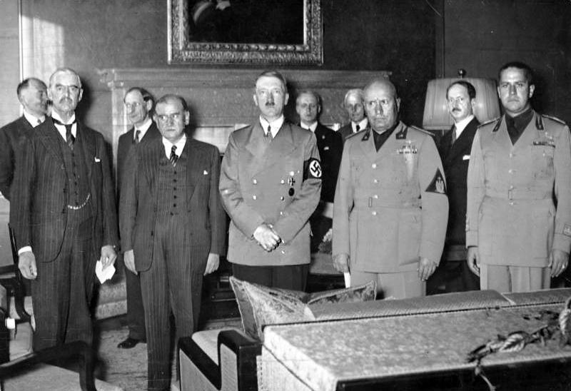 Adolf Hitler (center) and Benito Mussolini (to Hitler's left) at the signing of the Munich Agreement on Sept. 28, 1938.