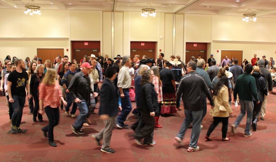 Myaamia people, Shawnee, and members of the public, taking part in a Stomp Dance at Miami University in Oxford, Ohio. Stomp dances are a tradition among some Native American tribes.