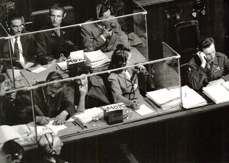 Interpreters at the Nuremberg Trial; Front: English desk; Back: French desk. To the left, monitor.