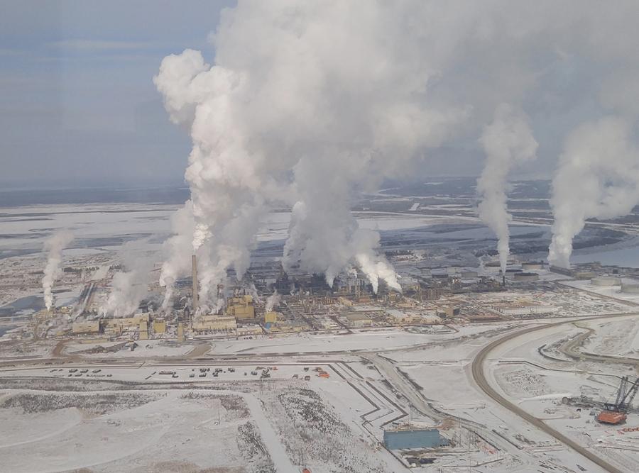 Oil from Alberta's tar sands region is key to the local and national economy, but it's especially carbon-intensive. Production in recent years has also transformed a remote forest wilderness into a barren industrial landscape.