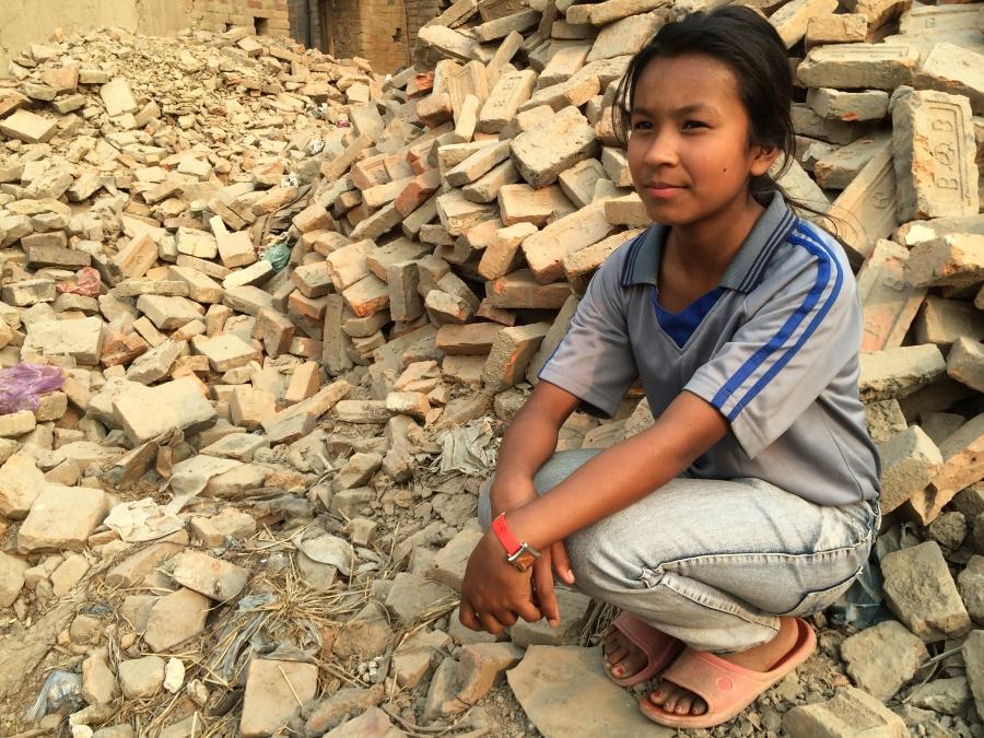 Shreesha Duwal at the site of her former home in Bhaktapur, Nepal