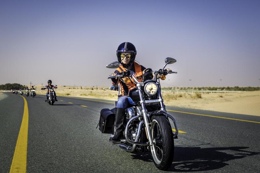 Shima Mehri leading the pack of Dubai Ladies of Harley riders on International Female Ride Day.