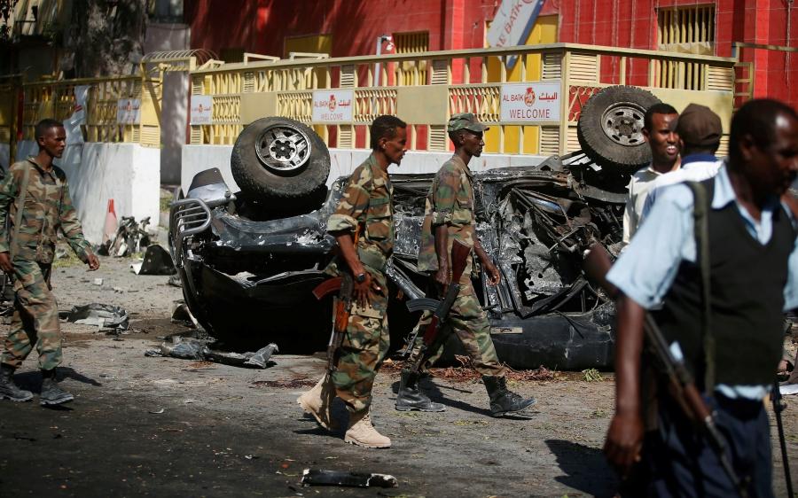 Somali government soldiers secure the scene of an attack on a restaurant by the Somali Islamist group al-Shabab in the capital Mogadishu, Oct. 1, 2016.  