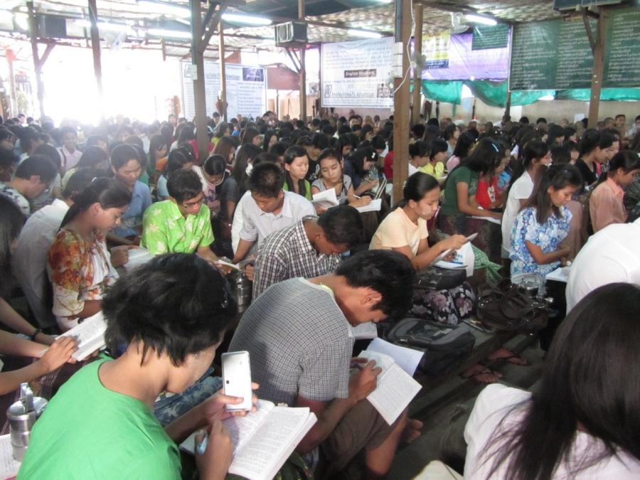 Studying English, with a little cell phone help (or distraction), in Yangon