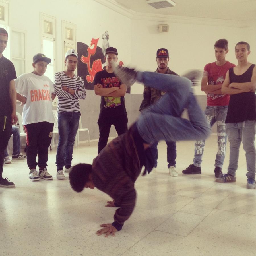 Ilyesse Gharbi, a high school dropout, is part of the Rocking Steps Crew. Here, showing some moves at the workshop.