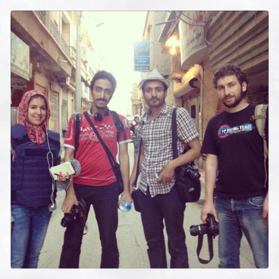 Marine and Karam (second from left) in Deir al-Zour, Syria, with two of Karam's friends.