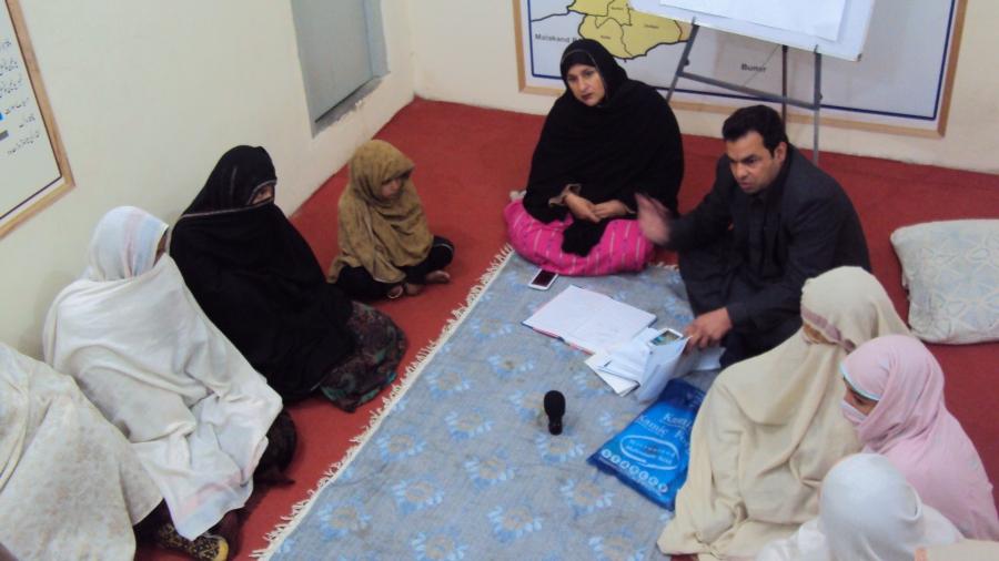 Tabassum Adnan (face pictured) leads a women’s jirga in the Swat Valley in northern Pakistan. Along with a male attorney, she is advising the group as women detail crimes against them such as robbery and physical abuse.