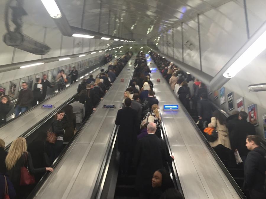 Morning commuters fill four escalators at Holborn Station in London, UK. 