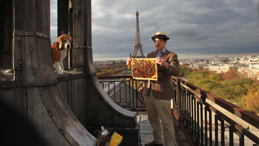 Audric de Campeau and his beagle Filou on the roof of the Ecole Militaire in Paris.