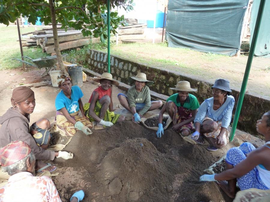 A group of local women sort compost for the reforestation project in the village of Kianjavato. Over the last five years the Madagascar Biodiversity Partnership has become the largest employer in the region.