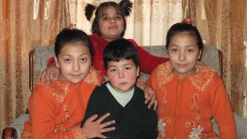Mehran, a bacha posh featured in the book poses with her sisters
