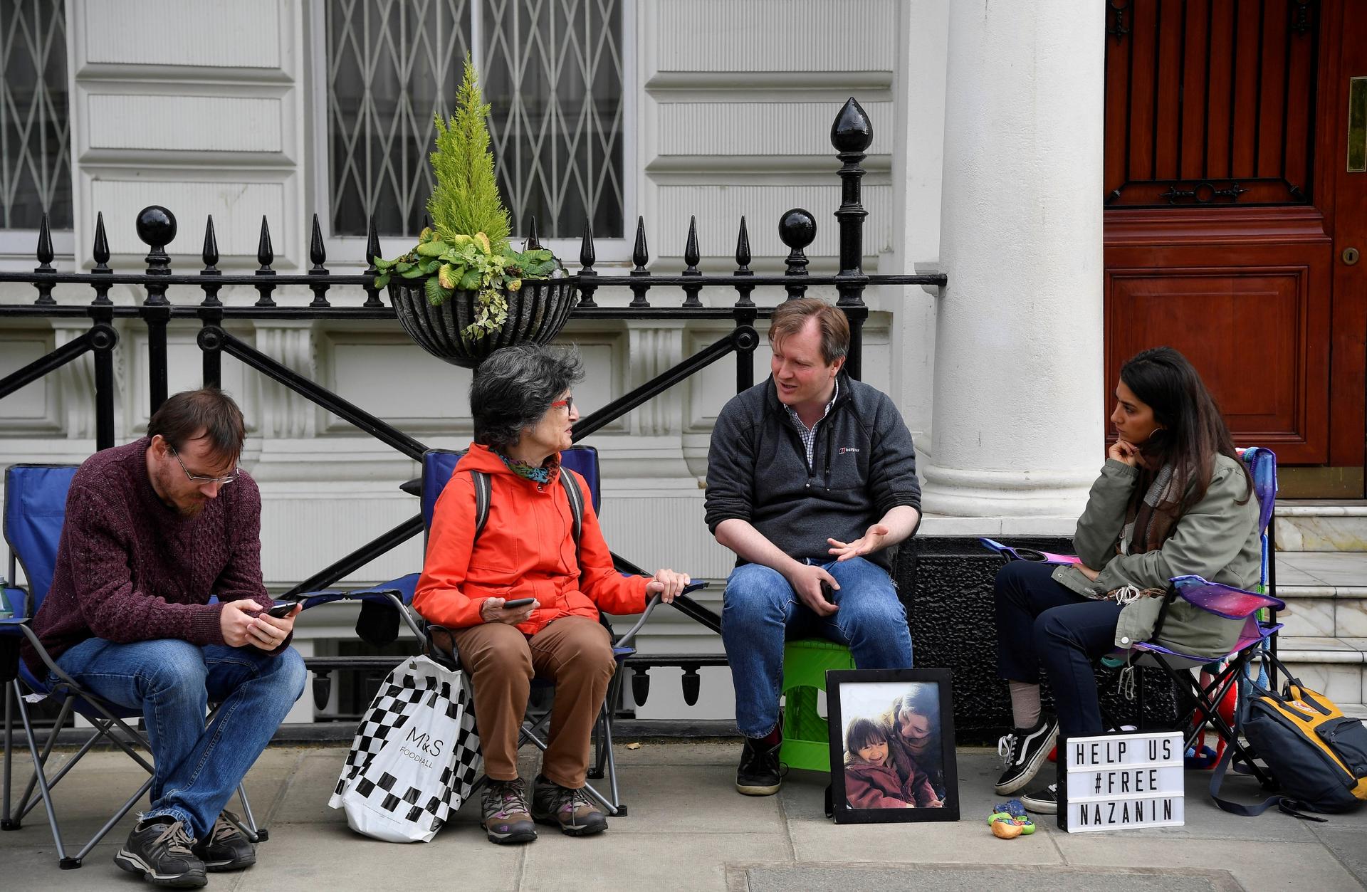 Richard Ratcliffe, the husband of jailed British-Iranian aid worker Nazanin Zaghari-Ratcliffe speaks with supporters as he stages a vigil and goes on hunger strike outside of the Iranian embassy in London, Britain, June 15, 2019. 