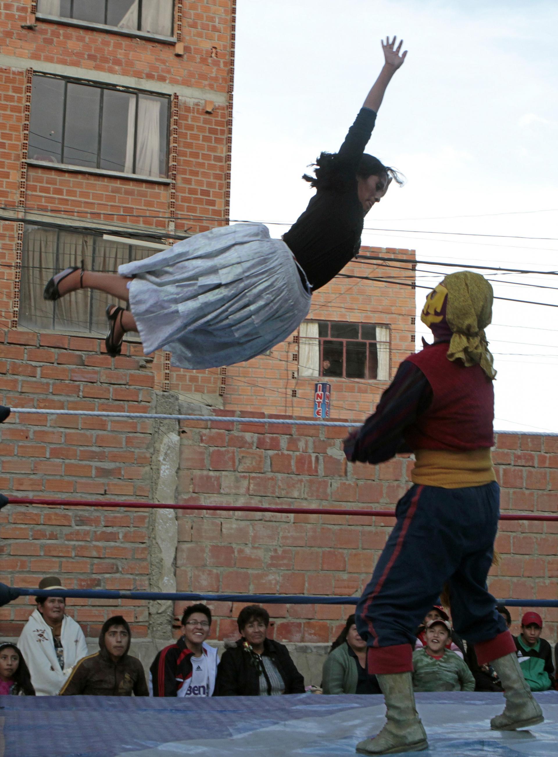 Two Bolivian cholitas wrestle