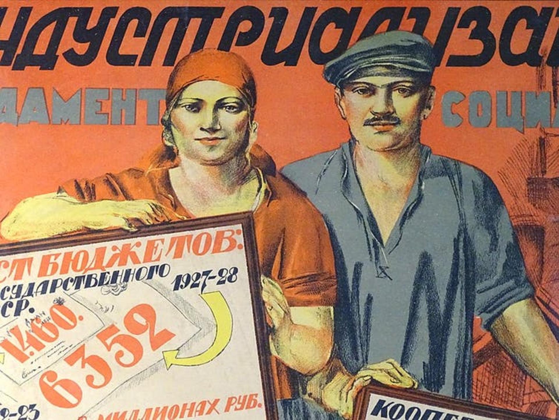 An old Soviet propaganda poster showing a man and a woman holding signs in Russian. 