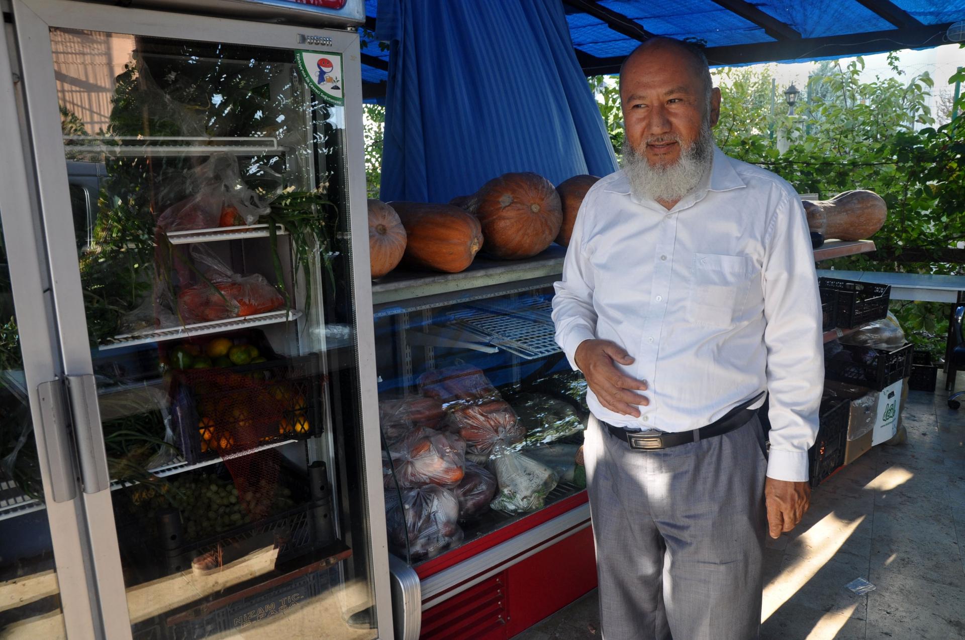 Imran Yakob is raising four of his grandchildren in Istanbul, supporting them with the proceeds of a small roadside shop.