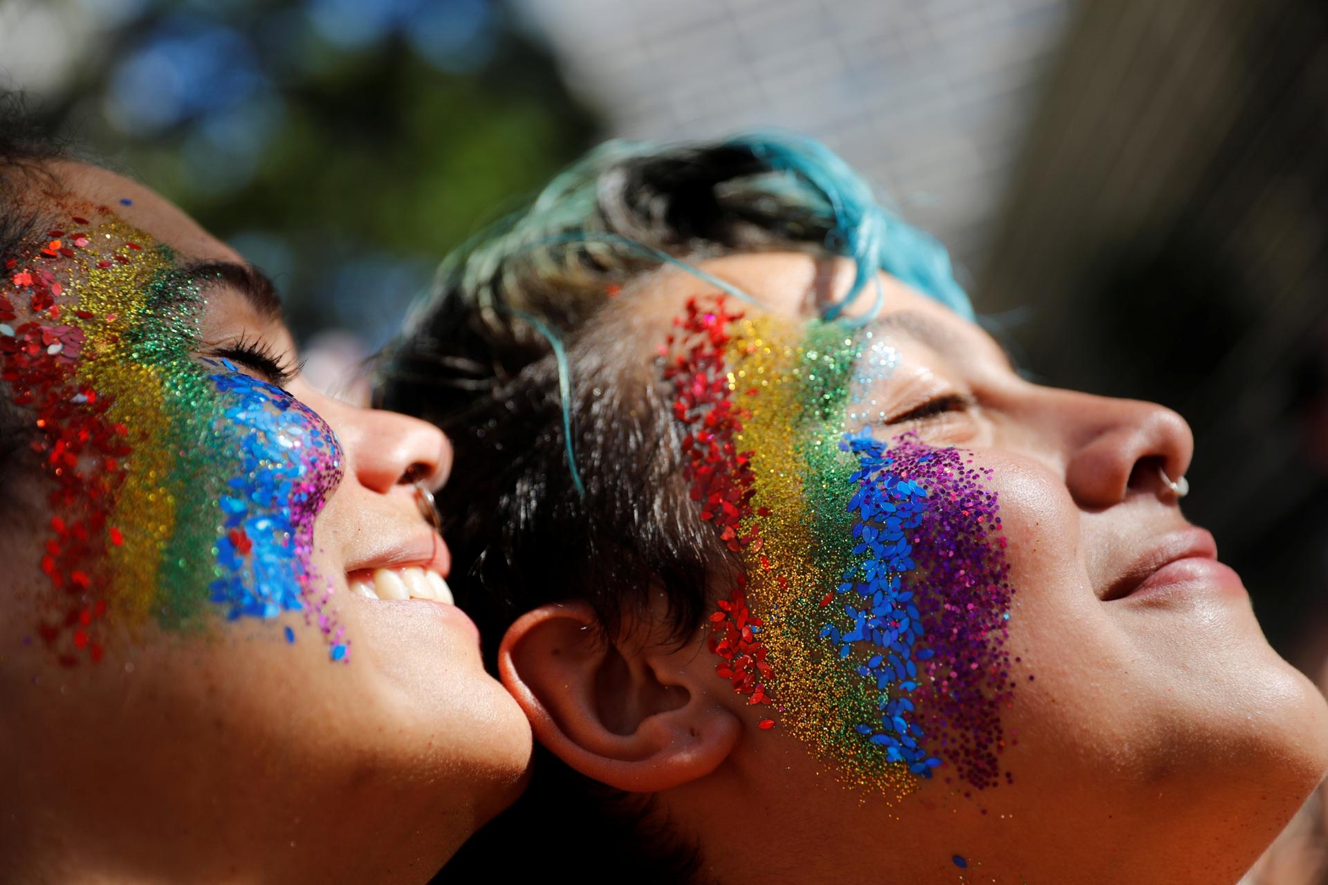 Revellers participate in the Gay Pride parade in Sao Paulo, Brazil, June 23, 2019. President Jair Bolsonaro has said sexual health education can change children's sexual orientations. 