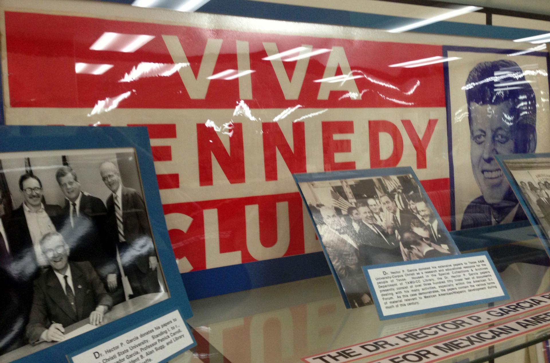 Old Viva Kennedy! campaign buttons of civil rights leader and G.I. Forum founder Dr. Hector P. Garcia, lower left, are shown at the Garcia exhibit at Texas A&M-Corpus Christi, Texas.