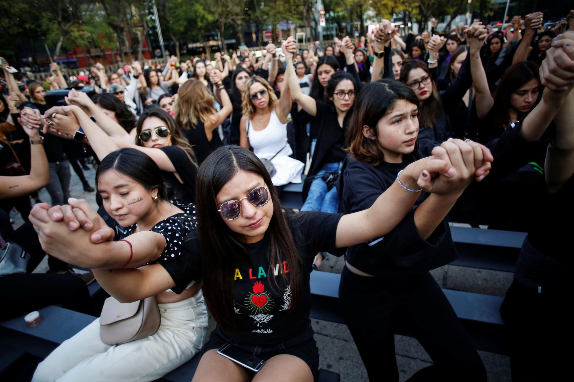 Women protest against gender violence and femicides at Angel de la Independencia monument in Mexico City, Mexico, Feb. 22, 2020.
