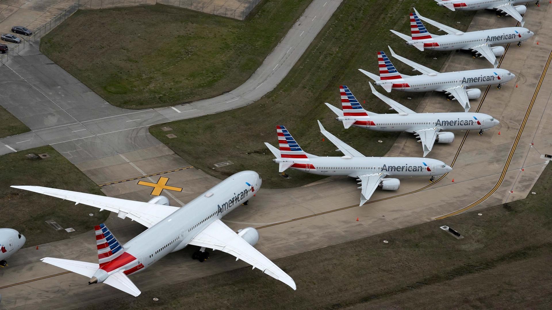 American Airlines passenger planes parked due to flight reductions made to slow the spread of coronavirus disease (COVID-19), at Tulsa International Airport in Tulsa, Oklahoma, on March 23, 2020.