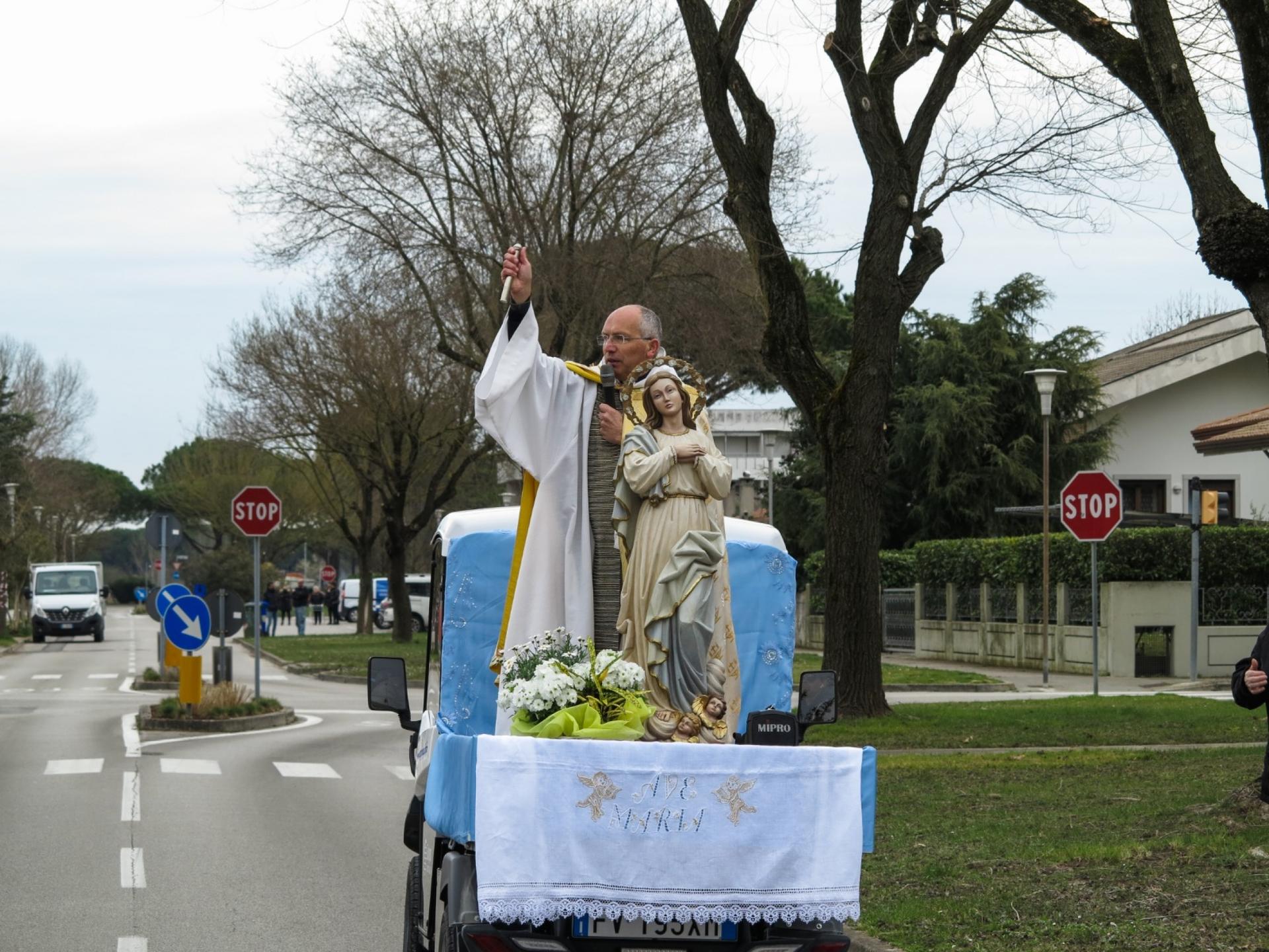 Rev. Andrea Vena, the priest of Bibiano, a small town on the coast near Venice, loaded a statue of the madonna on a three-wheeled car and set off along the streets of his town one March morning.